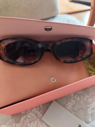 Occhiali da sole Miu Miu donna in pasta marrone