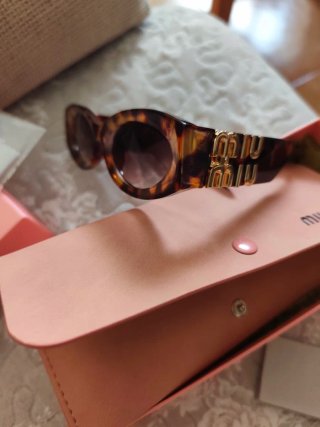 Occhiali da sole Miu Miu donna in pasta marrone