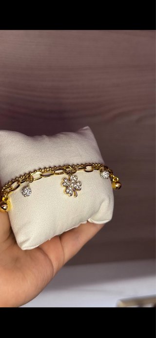 Bracciale donna oro con ciondoli