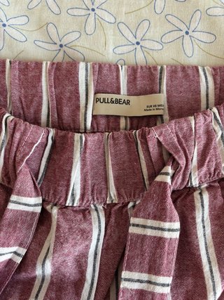 Pantalón corto a rayas