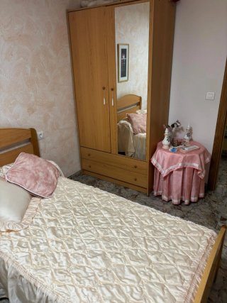 Sofá, cama y armario