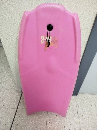 Tabla de surf rosa para niños