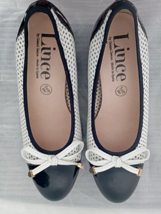 Zapatos Lince charol negro y piel perforada