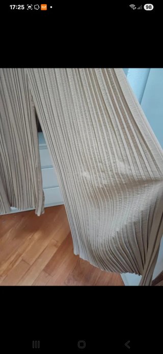 Pantaloni palazzo plissettati beige