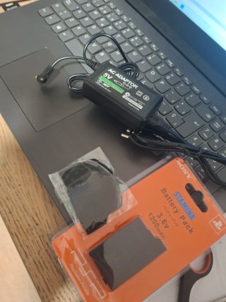 Batteria, caricatore e cover per PSP 2004 3004