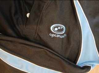 Conjunto deportivo Optimun polo y shorts