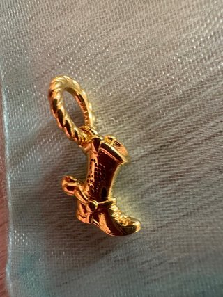 Charm stivale di woody dorato toy story