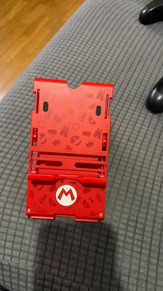 Nintendo Switch + Soporte TV y Cables