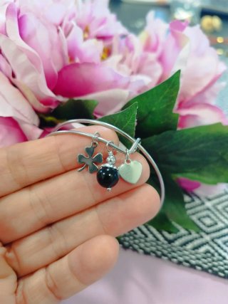 Braccialetto acciaio con charms