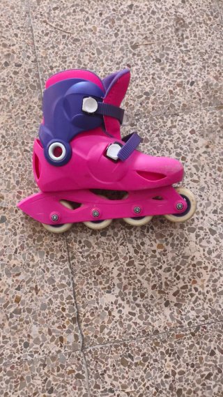Patines de 4 ruedas rosas y morados