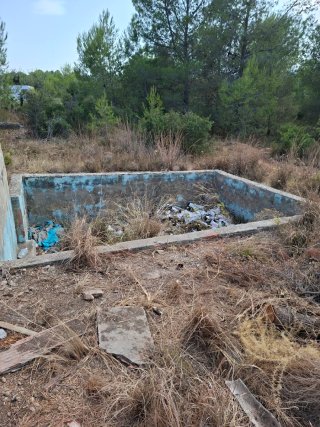 Terreno con casa para restaurar