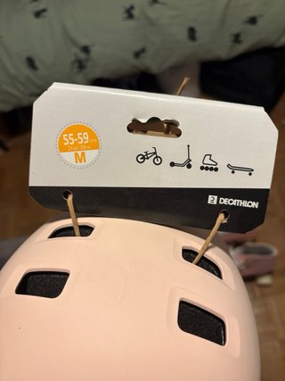 Patines rosas sin estrenar + casco