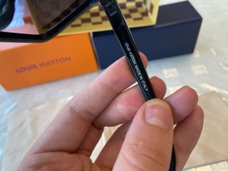 Occhiali da sole Louis Vuitton neri e oro
