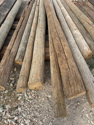 Postes de madera redondos luz precio unidad