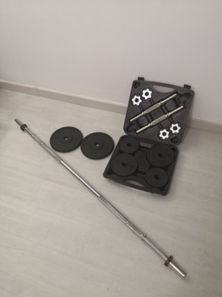 Barra y discos de pesas