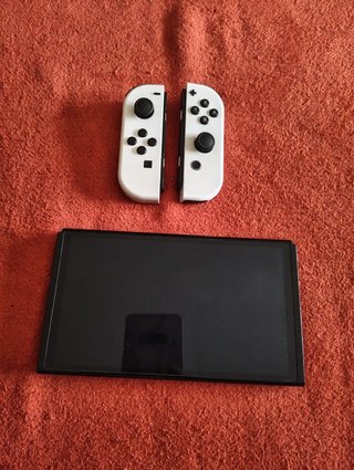 Nintendo Switch OLED + 3 Giochi