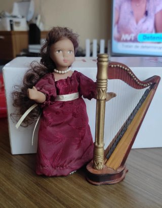 Bambole in porcellana con accessori