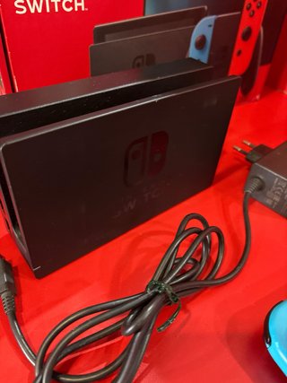 Nintendo Switch + Caja Azul/Amarillo