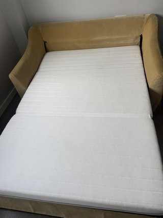 Sofá cama desenfundable amarillo