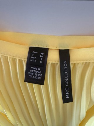 Falda plisada amarilla Mango
