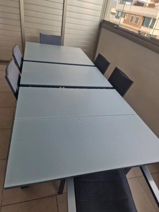Mesa extensible y 6 sillas exterior