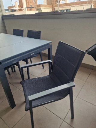 Mesa extensible y 6 sillas exterior