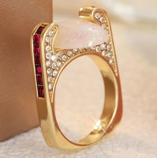 Anello placcato oro con pietre bianche e rosse