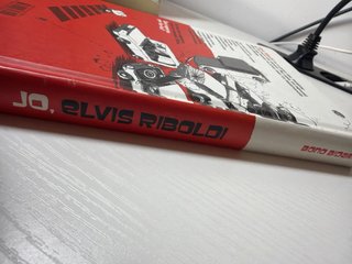 Jo, Elvis Riboldi