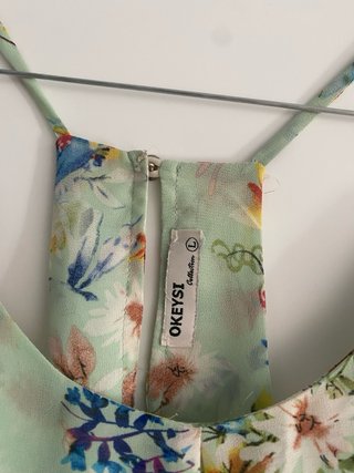Blusa muy bonita Okeysi Flores Talla L
