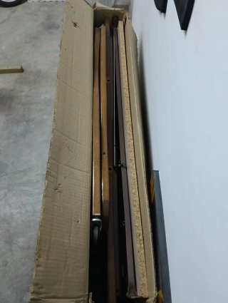 Cuna de madera con ruedas