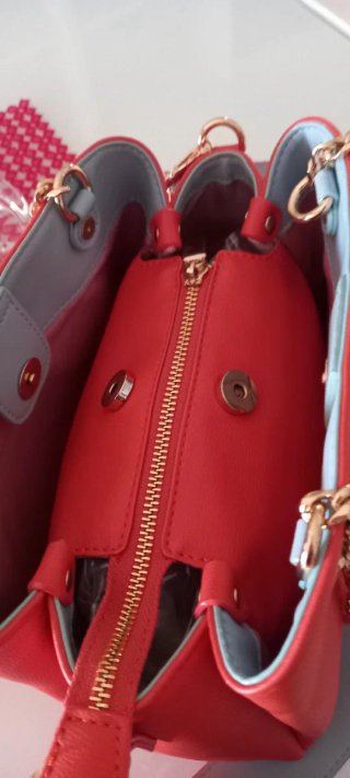 Borsa Gaudi arancione con dettagli oro