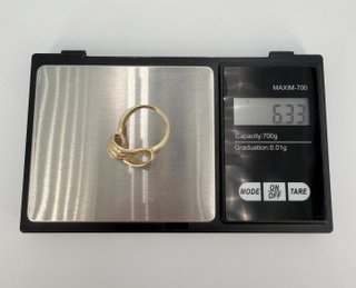 Anillo de oro de 18k con circonitas, 6.33 g, T-16.