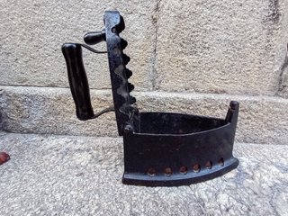 Plancha antigua de carbón