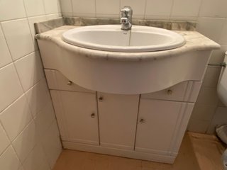 Mueble de baño mármol y madera