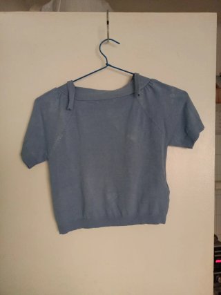 Bolero azul claro de manga corta