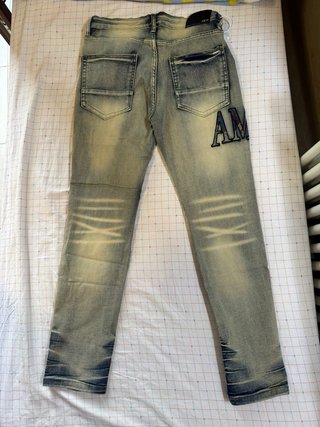 Jeans Amiri uomo distressed