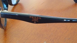 Occhiali da sole Prada SPR 21N donna neri