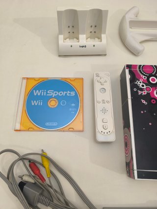 Pacchetto Nintendo Wii con Controller, Gioco e Accessori