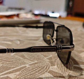 Occhiali da sole Louis Vuitton neri e argento