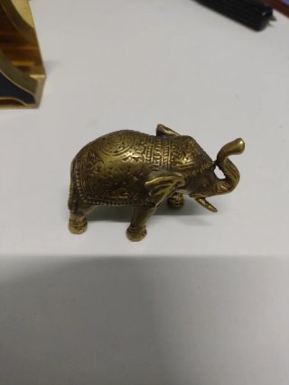 Lote: Reloj elefante y adorno de oso
