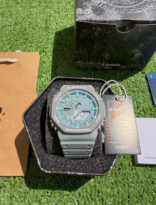 Reloj G-Shock Gris y Turquesa