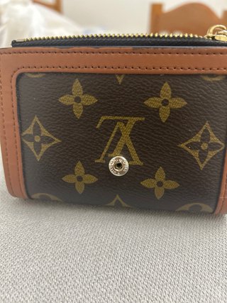 Portafoglio Louis Vuitton scucita la fodera ripara