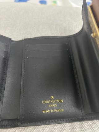 Portafoglio Louis Vuitton scucita la fodera ripara