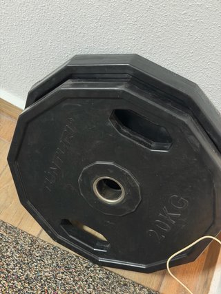 Discos de pesa 20kg Tunturi y barra olímpica
