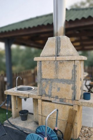 Barbacoa de obra piedra y metal