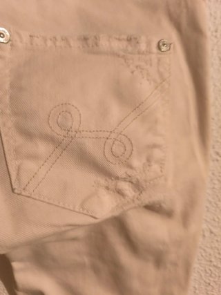 Pantalón blanco desgarrado skinny