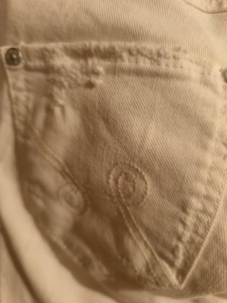 Pantalón blanco desgarrado skinny