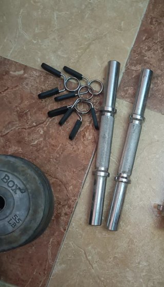 Mancuernas y pinzas para discos