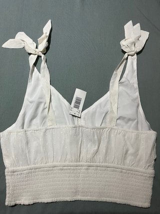 Top blanco Hollister con lazos