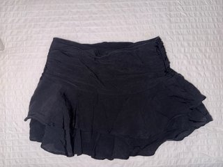 Falda Zara volantes negra